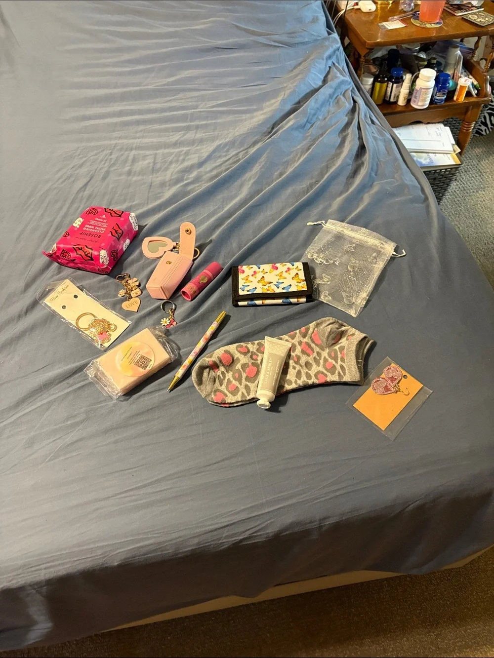 Women purse charms lip balm pen wipes socks lotion socks wallet and soap
